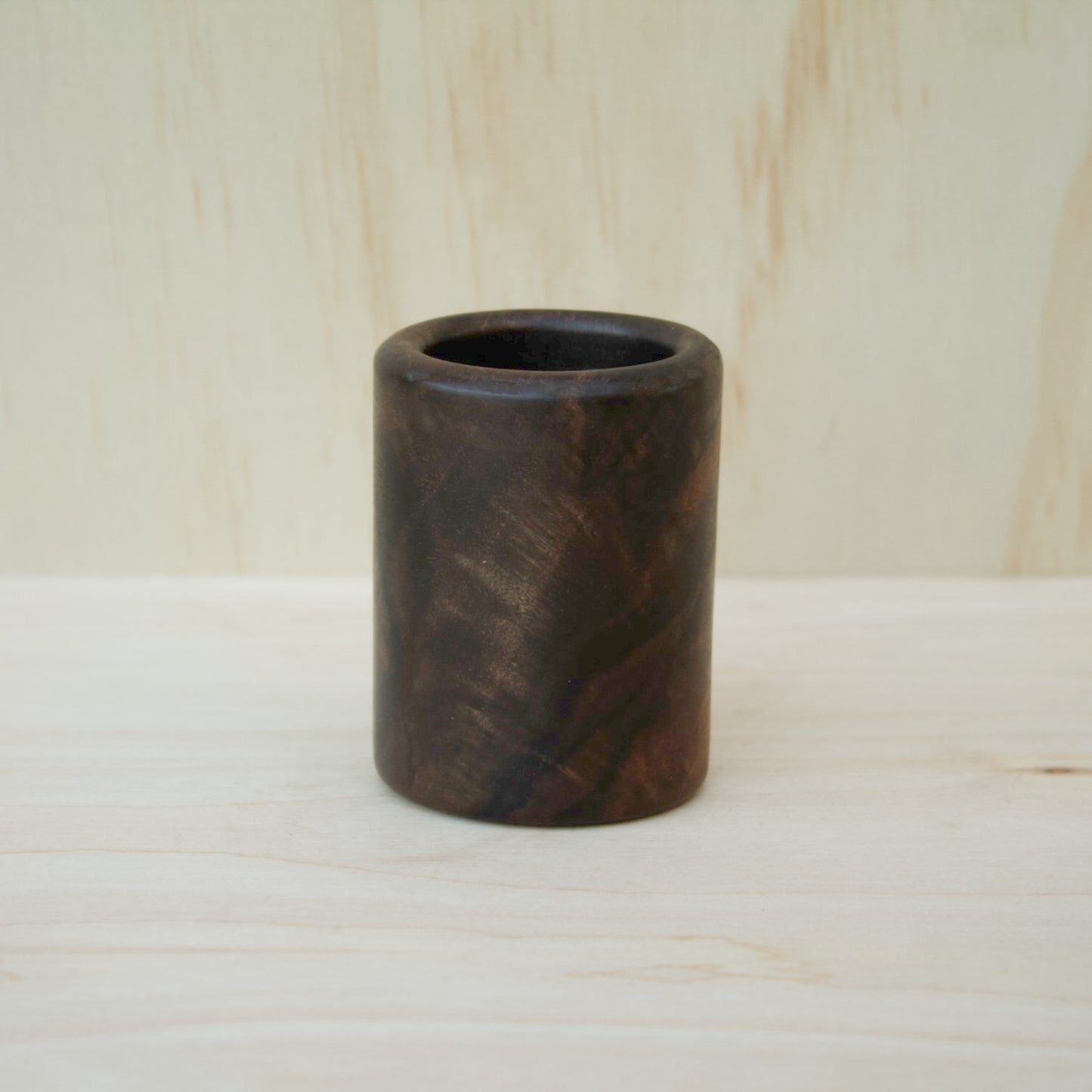 dark wooden shot glass made of walnut wood
