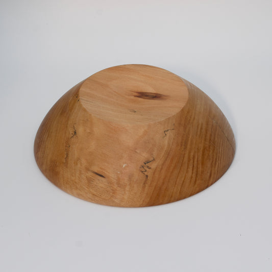 Wooden bowl on a white background