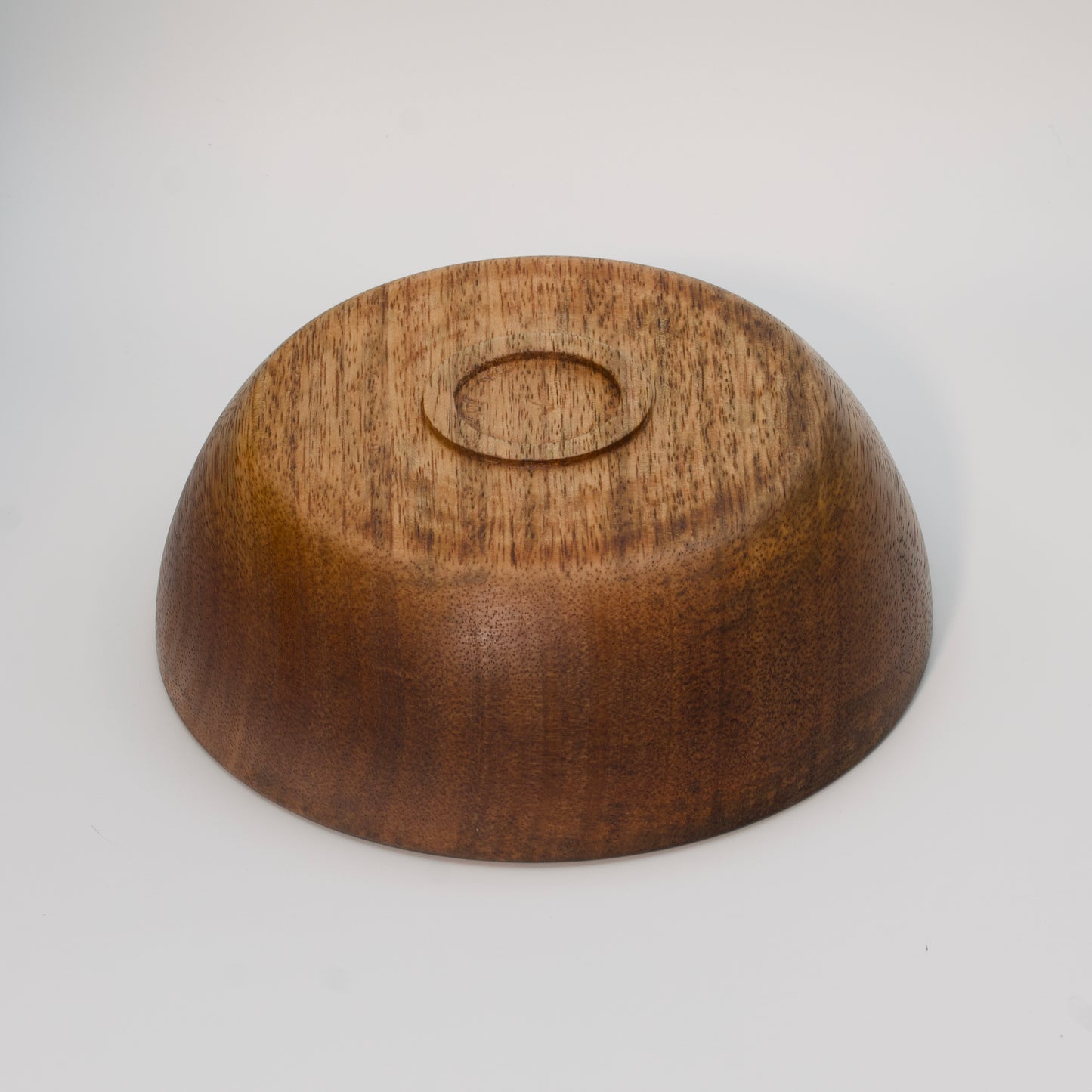 Mango wood bowl against white background
