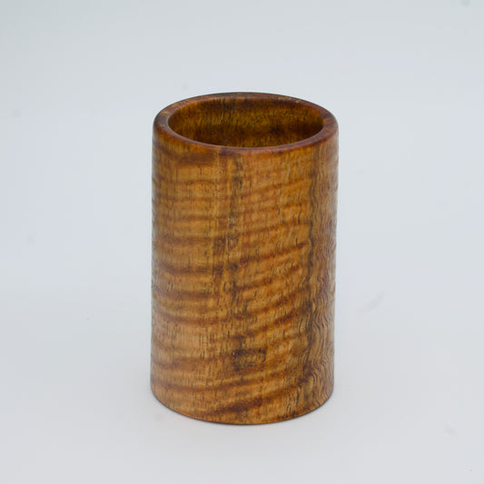 Magno wood shot glass against white background