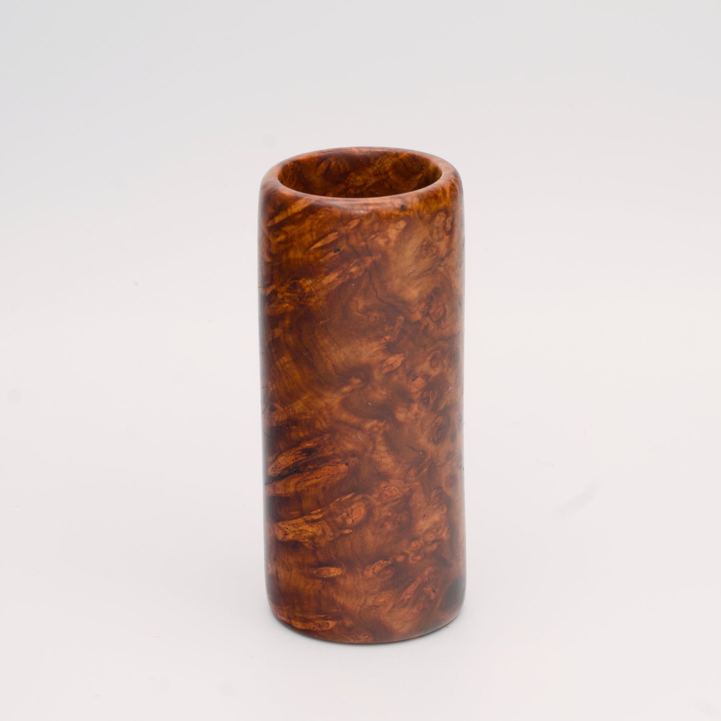Big Leaf Maple Burl wood shot glass against white background