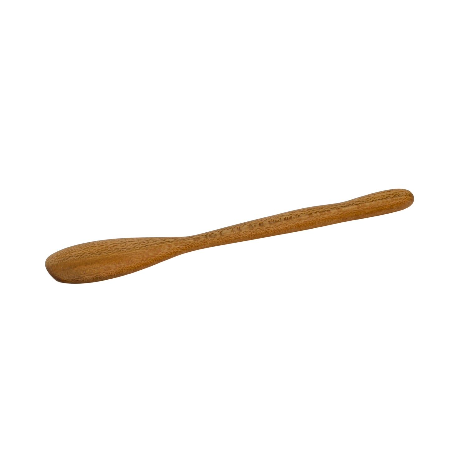 Wooden spoon on a beige background