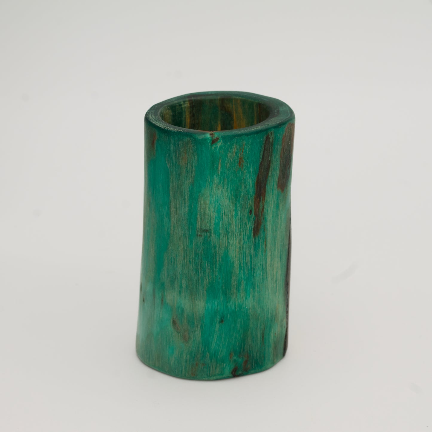 Green plains cottonwood shot glass on white background