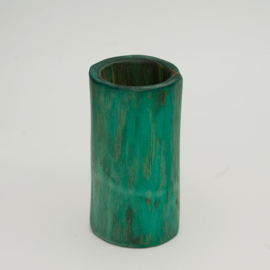 Green plains cottonwood shot glass on white background