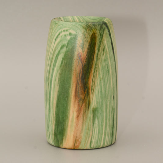 Aspen wood shot glass against grey background