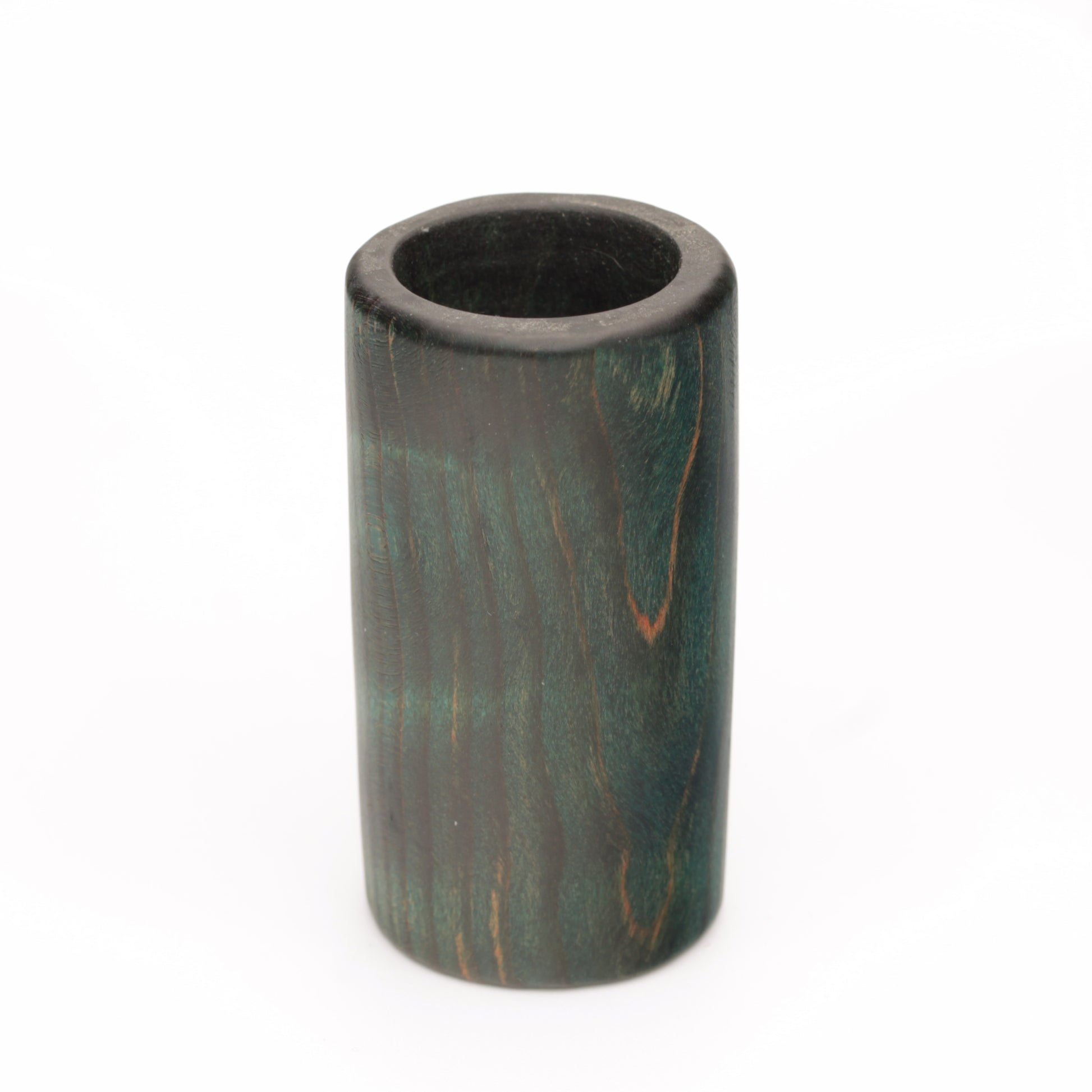 wooden shot glass made of ash wood dyed in blue on white background