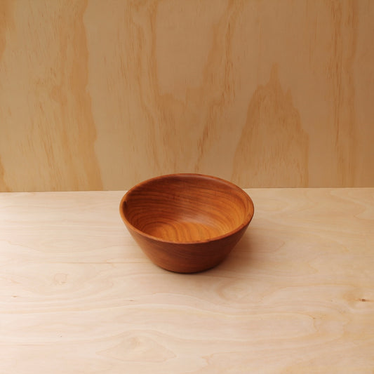 top of the large wooden salad bowl