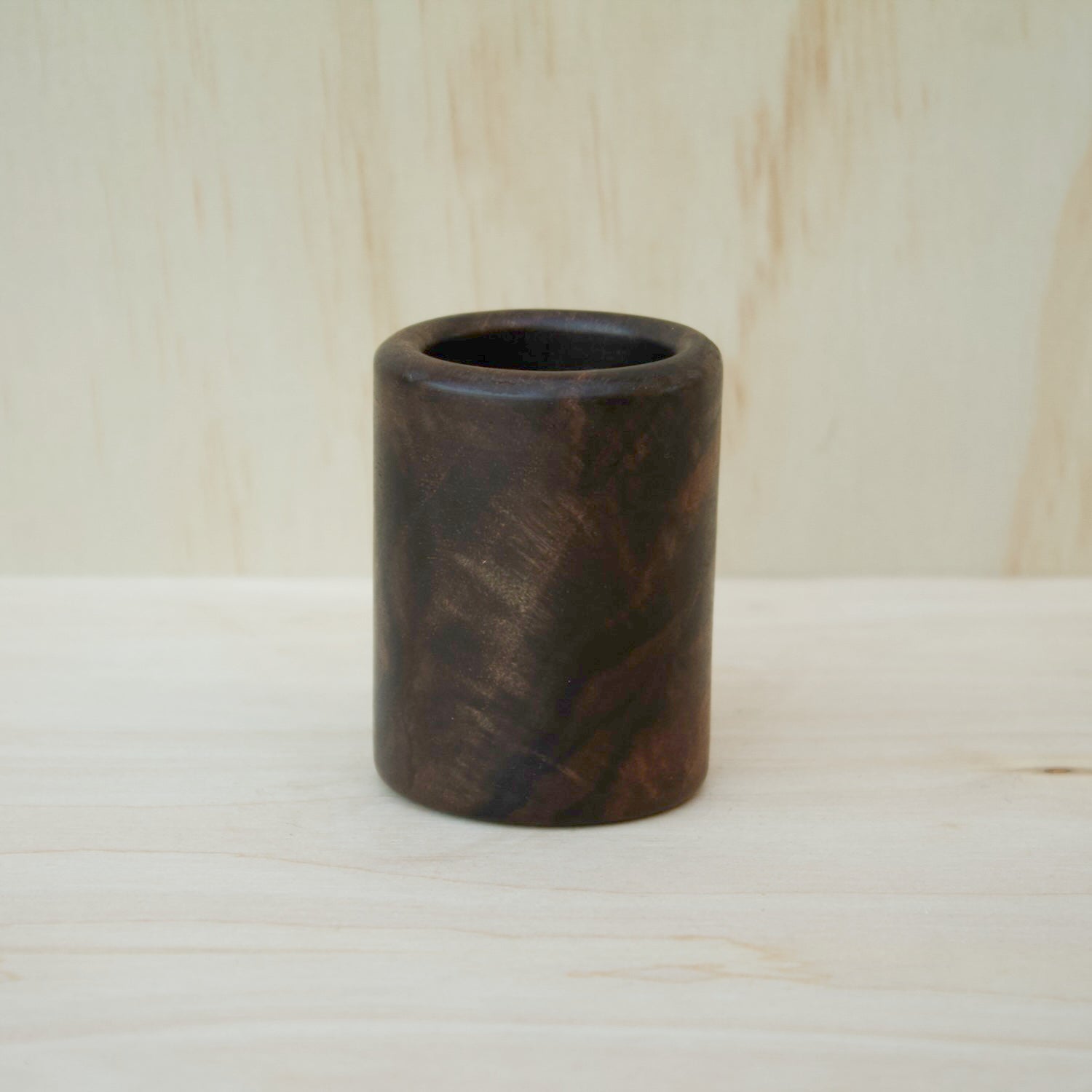 dark wooden shot glass made of walnut wood