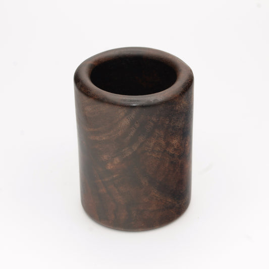 dark wooden cup with bold, intricate grain lines and deep tones