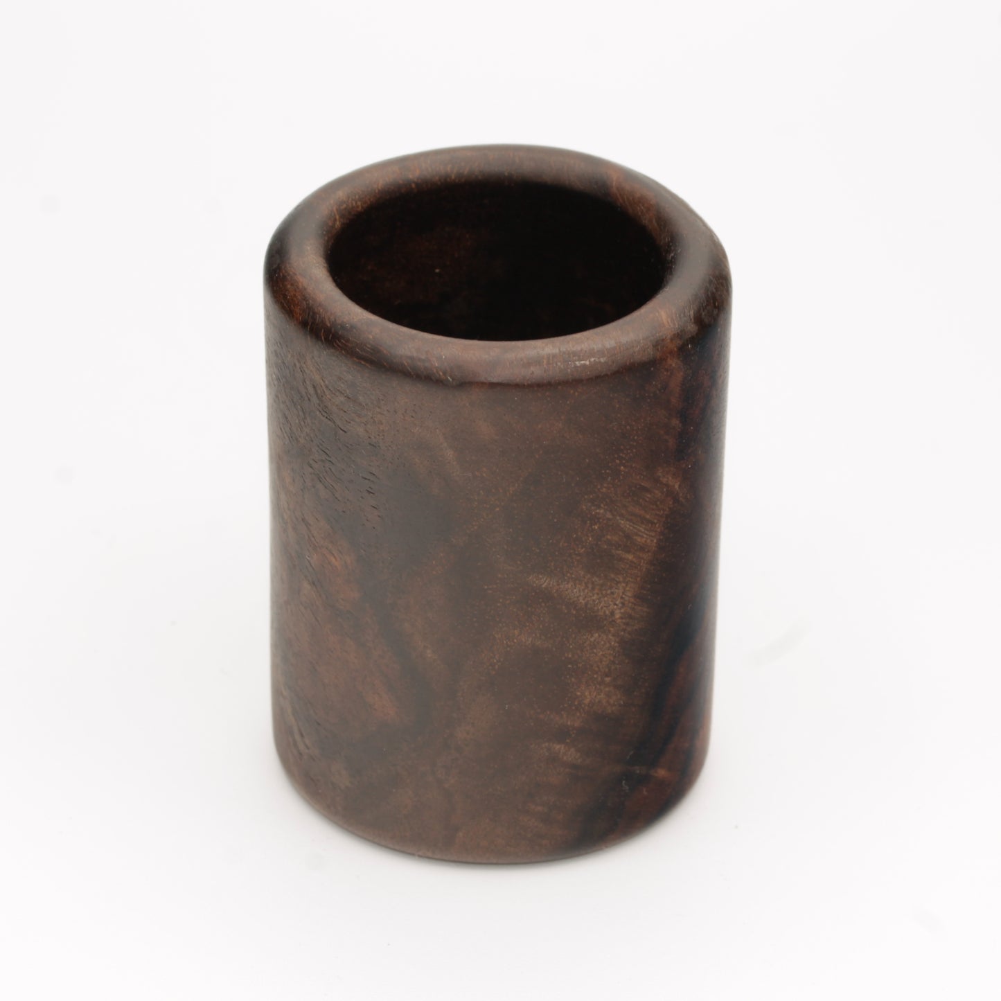 dark wooden cup with bold, intricate grain lines and deep tones