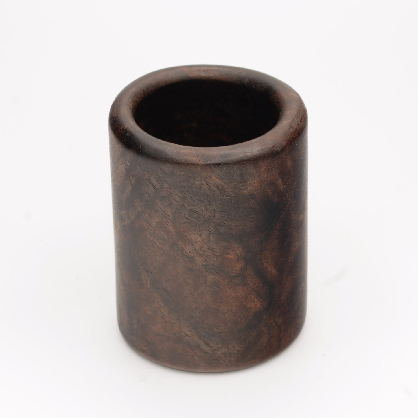 dark wooden cup with bold, intricate grain lines and deep tones
