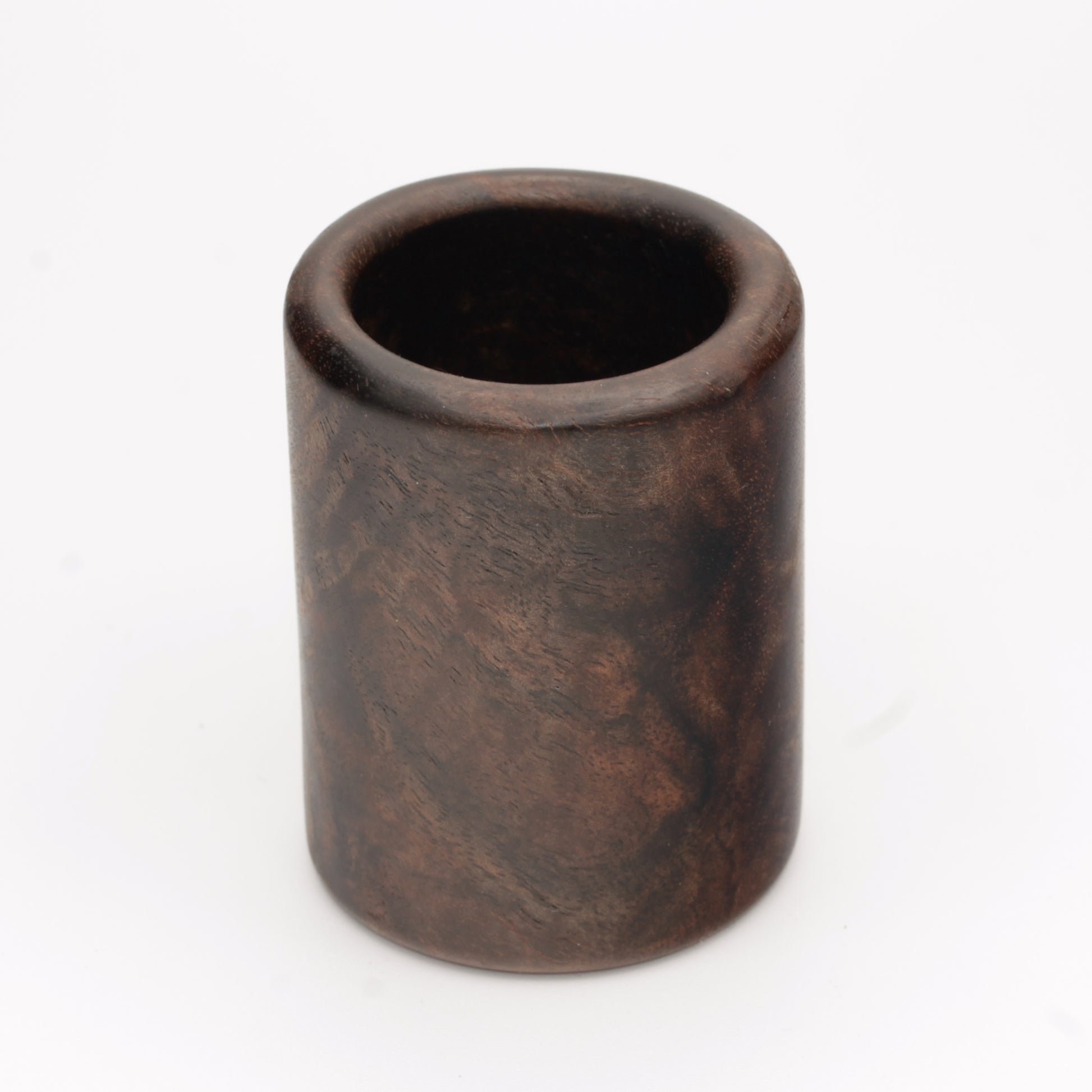dark wooden cup with bold, intricate grain lines and deep tones