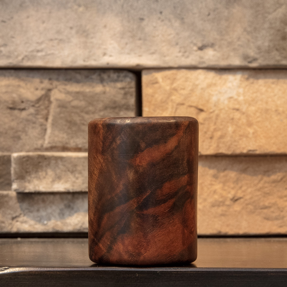 Claro Unbound shot glass showing bold intersecting dark and reddish Claro Walnut figure