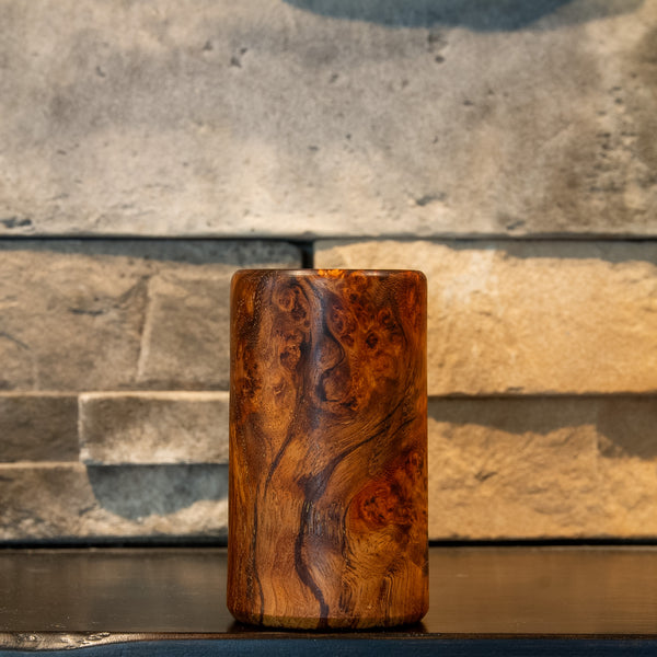 Crown Burl stabilized Big Leaf Maple burl shot glass with dense swirling eyes and contrasting amber and dark figure