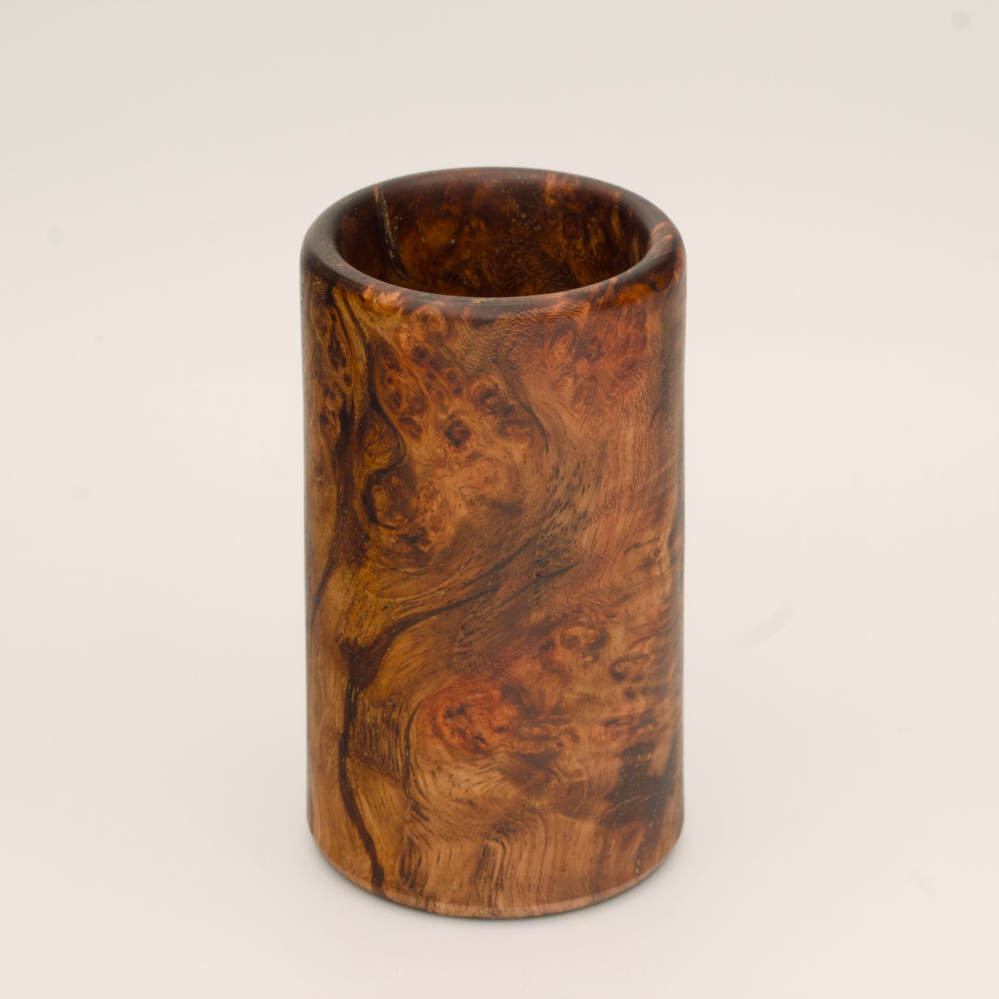 Big Leaf Maple Burl wood shot glass against white background