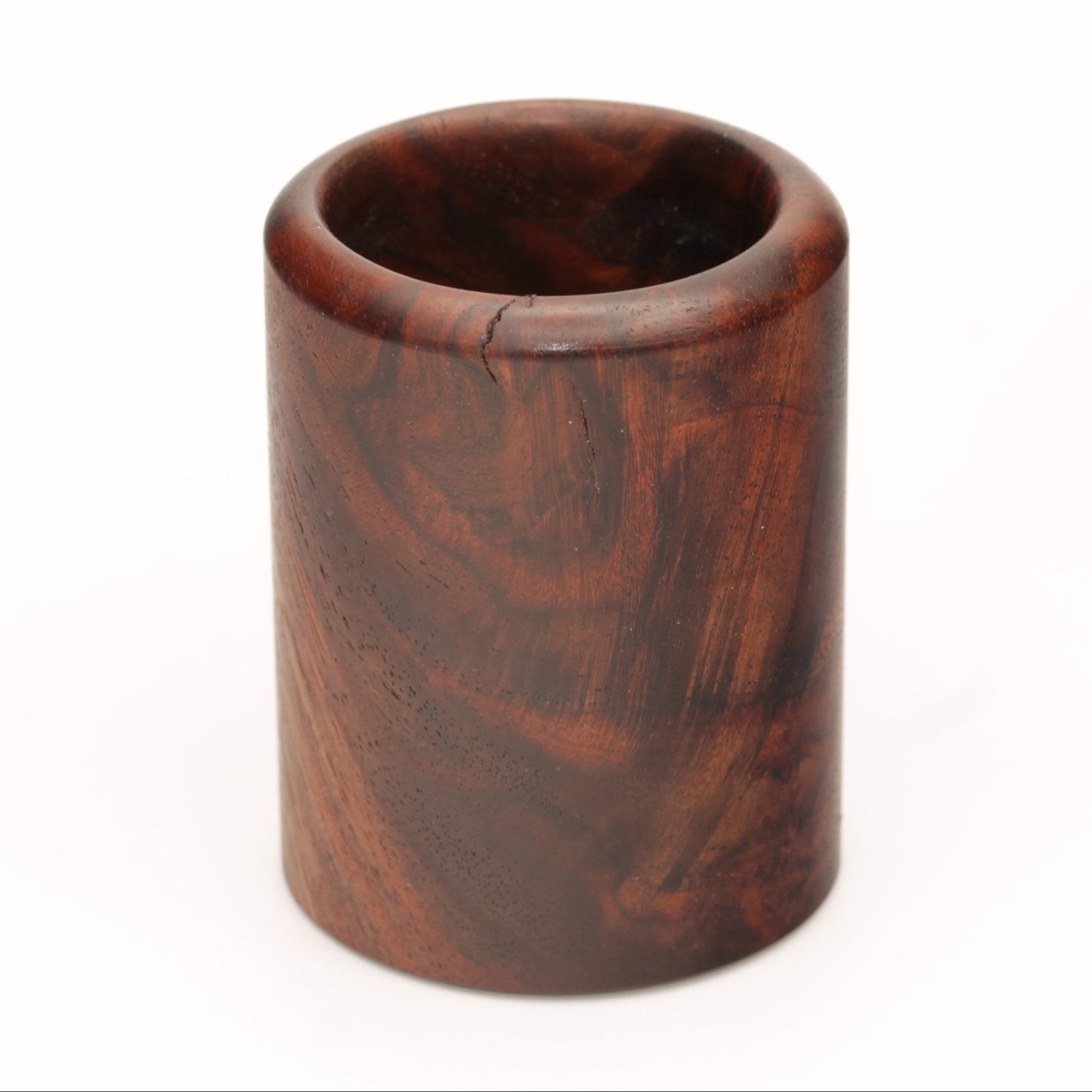 rich brown wooden with lighter streaks and subtle variations in grain shot glass on a white background. 