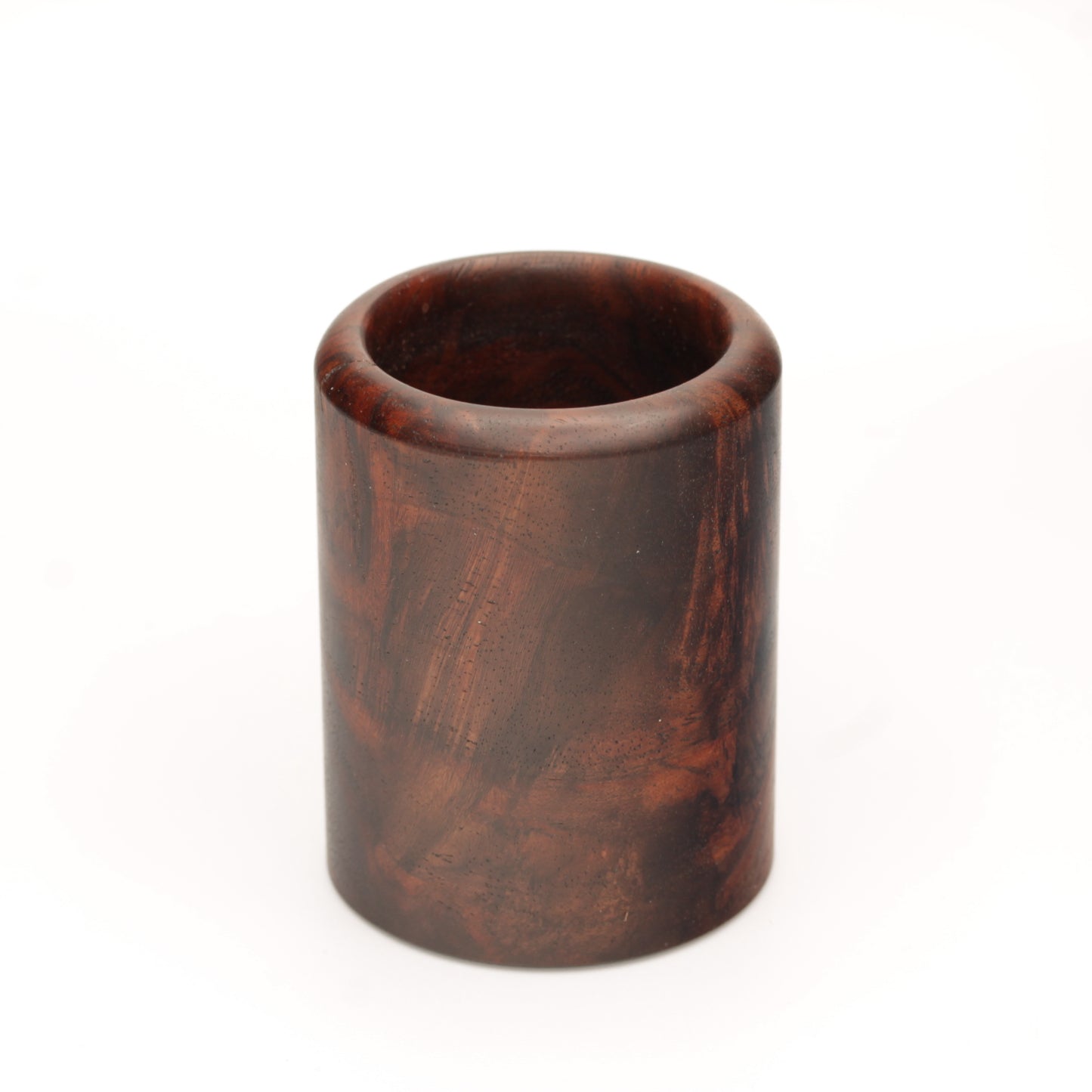 rich brown wooden with lighter streaks and subtle variations in grain shot glass on a white background. 