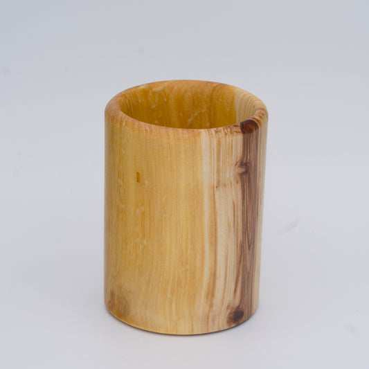 Aspen wood shot glass against white background
