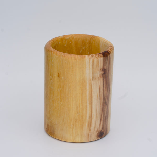 Aspen wood shot glass against white background