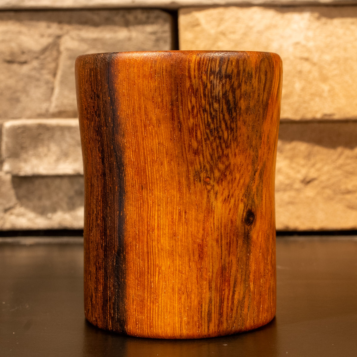 Pheasantwood shot glass on fireplace mantle