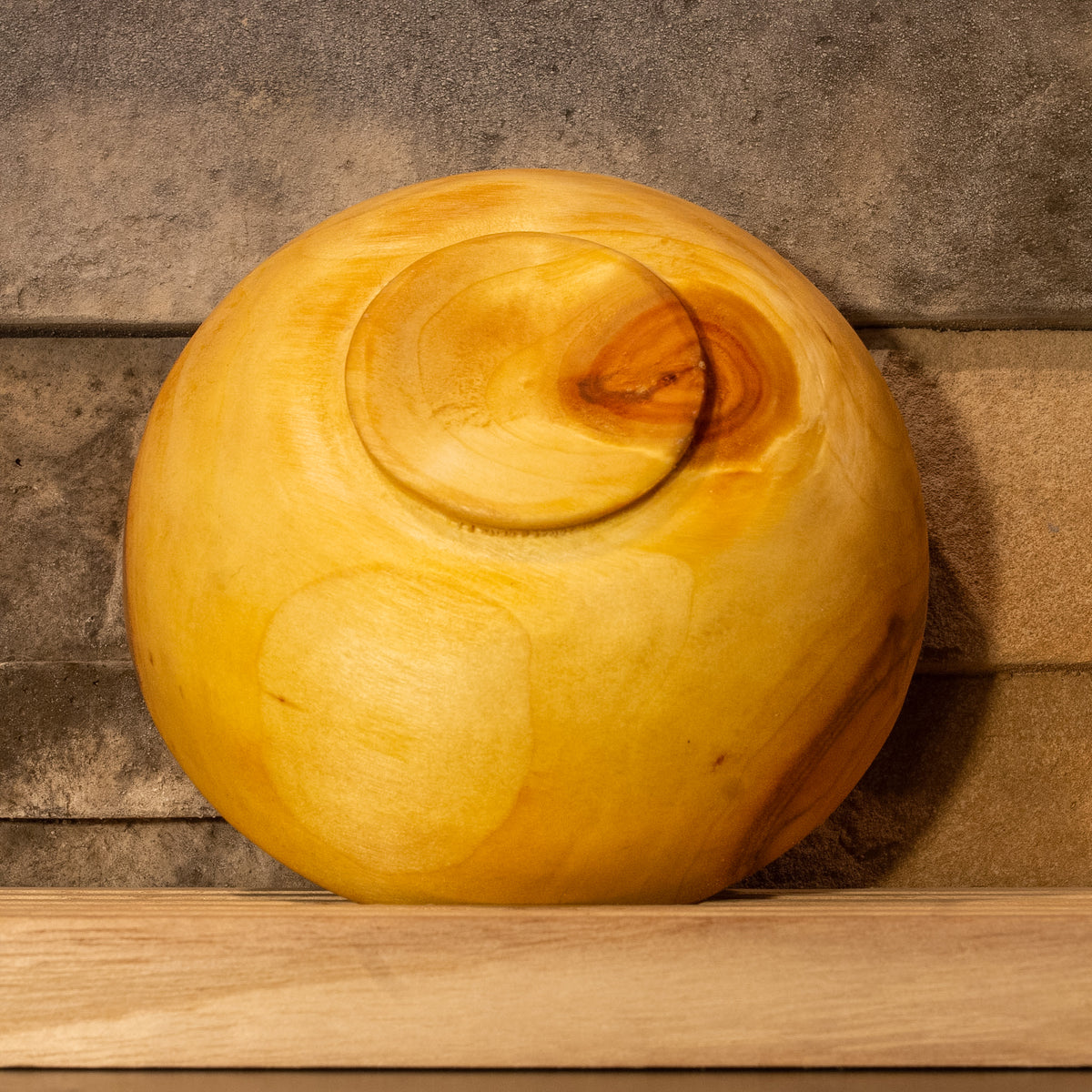 Underside of The High Plains Vessel showing the turned foot and a small natural knot nub on the base