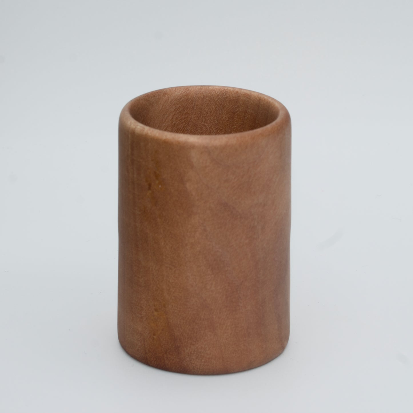 Nara wood shot glass on white background