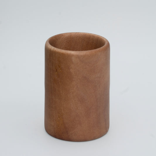 Nara wood shot glass on white background