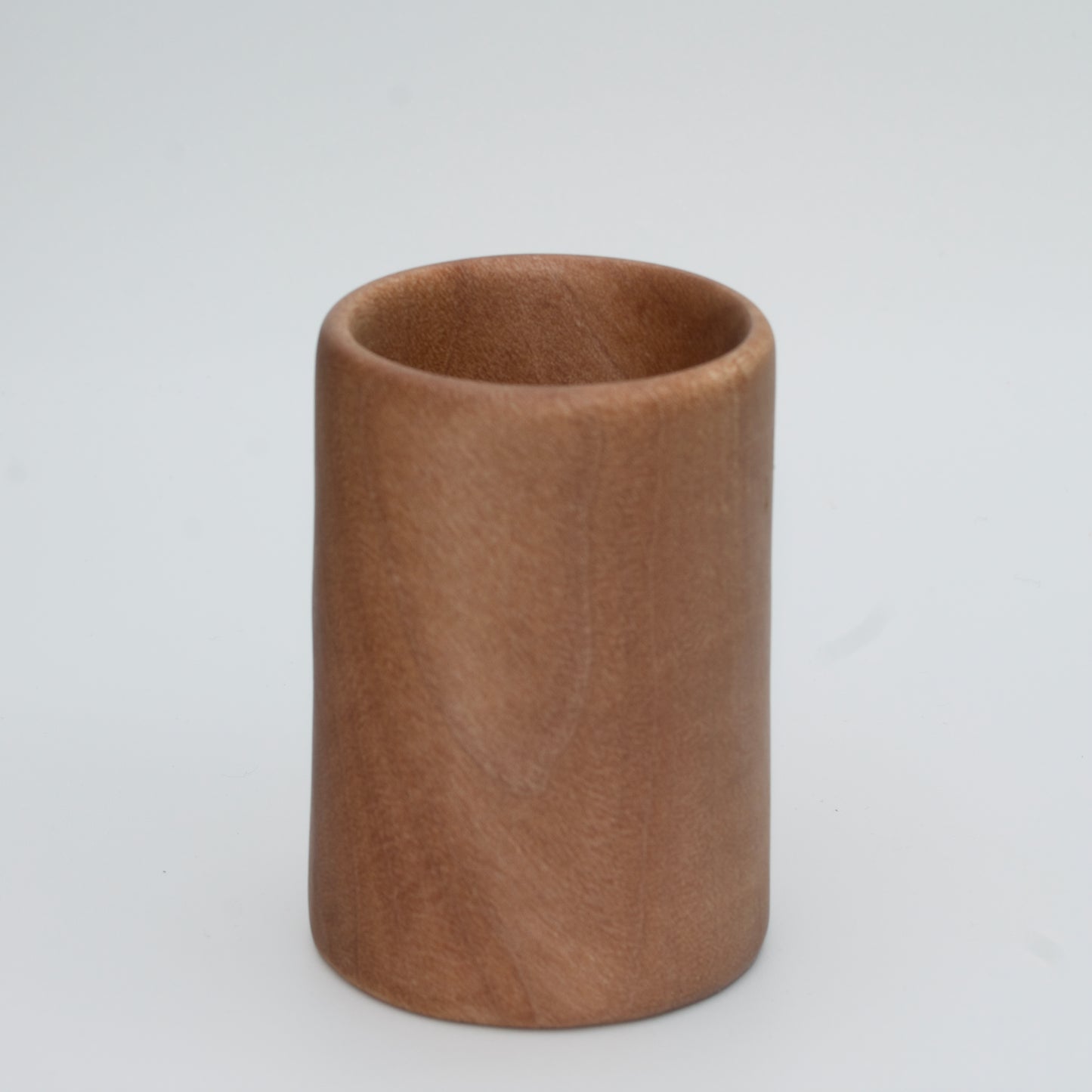 Nara wood shot glass on white background