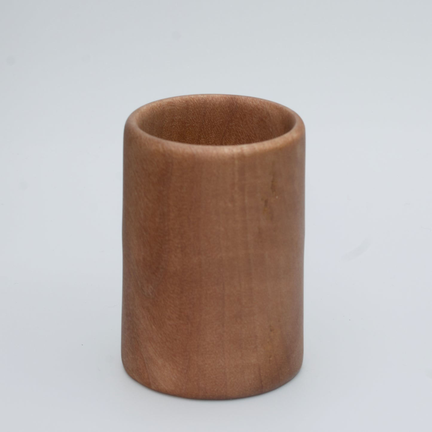 Nara wood shot glass on white background