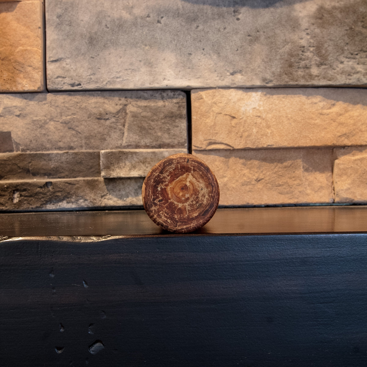 Bottom view of The Eddy showing circular end grain and natural color variation