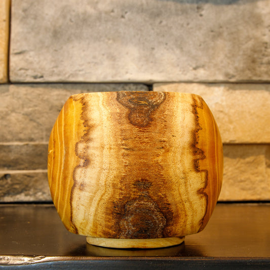Side view of The Learning Curve White Mulberry whiskey cup showing dark spalted figure across the grain.