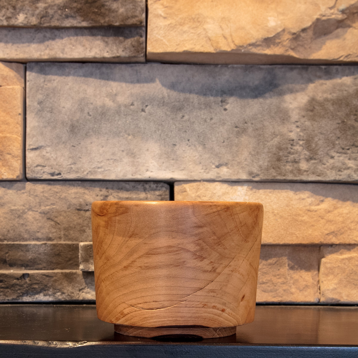 The Second Amber Sweetgum whiskey cup showing natural exterior checks and varied amber grain