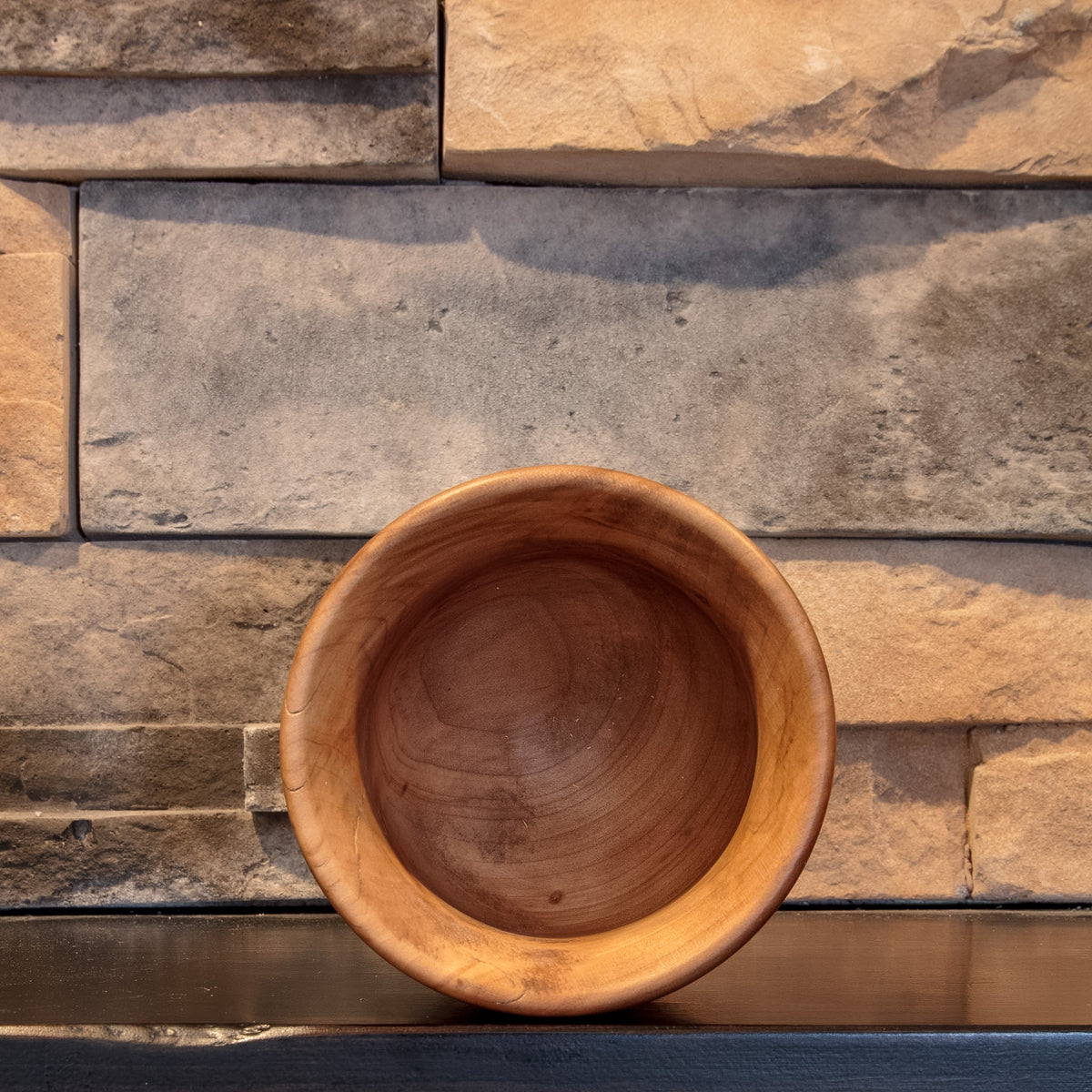 Opening view of The Second Amber showing the broad rounded rim and deep dark Sweetgum interior
