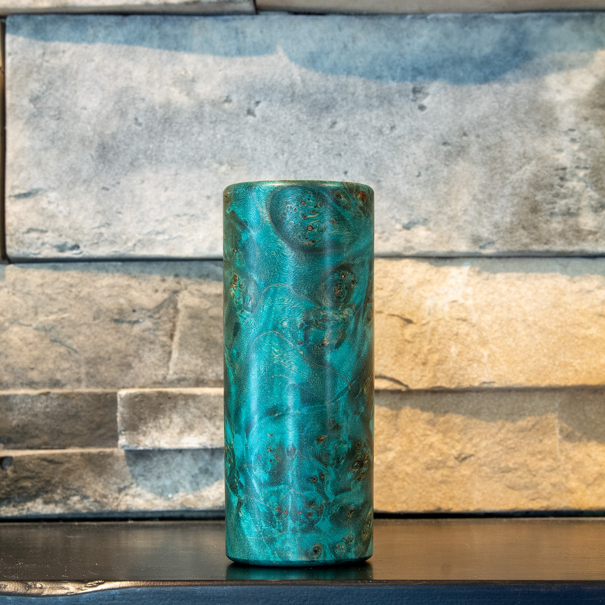 The Verdant Spire showing clustered teal burl eyes and swirling figure