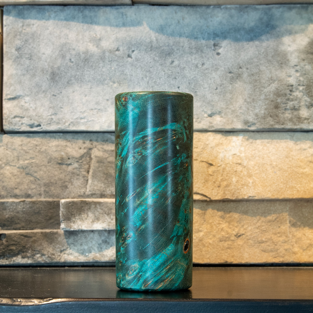 Alternate side of The Verdant Spire with sweeping teal and dark burl figure
