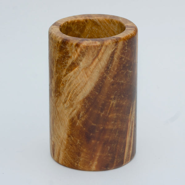 Box elder burl wood shot glass against white background