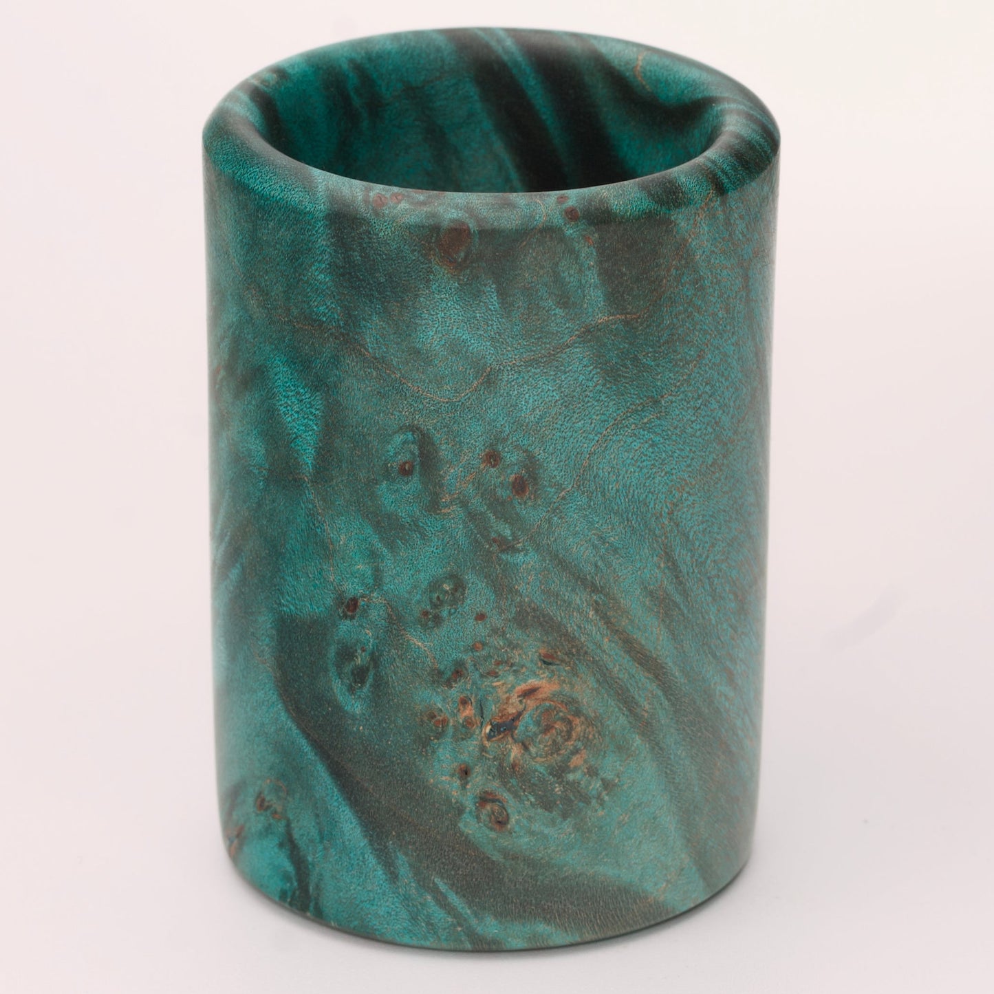 Green dyed Mappa Burl shot glass against white background