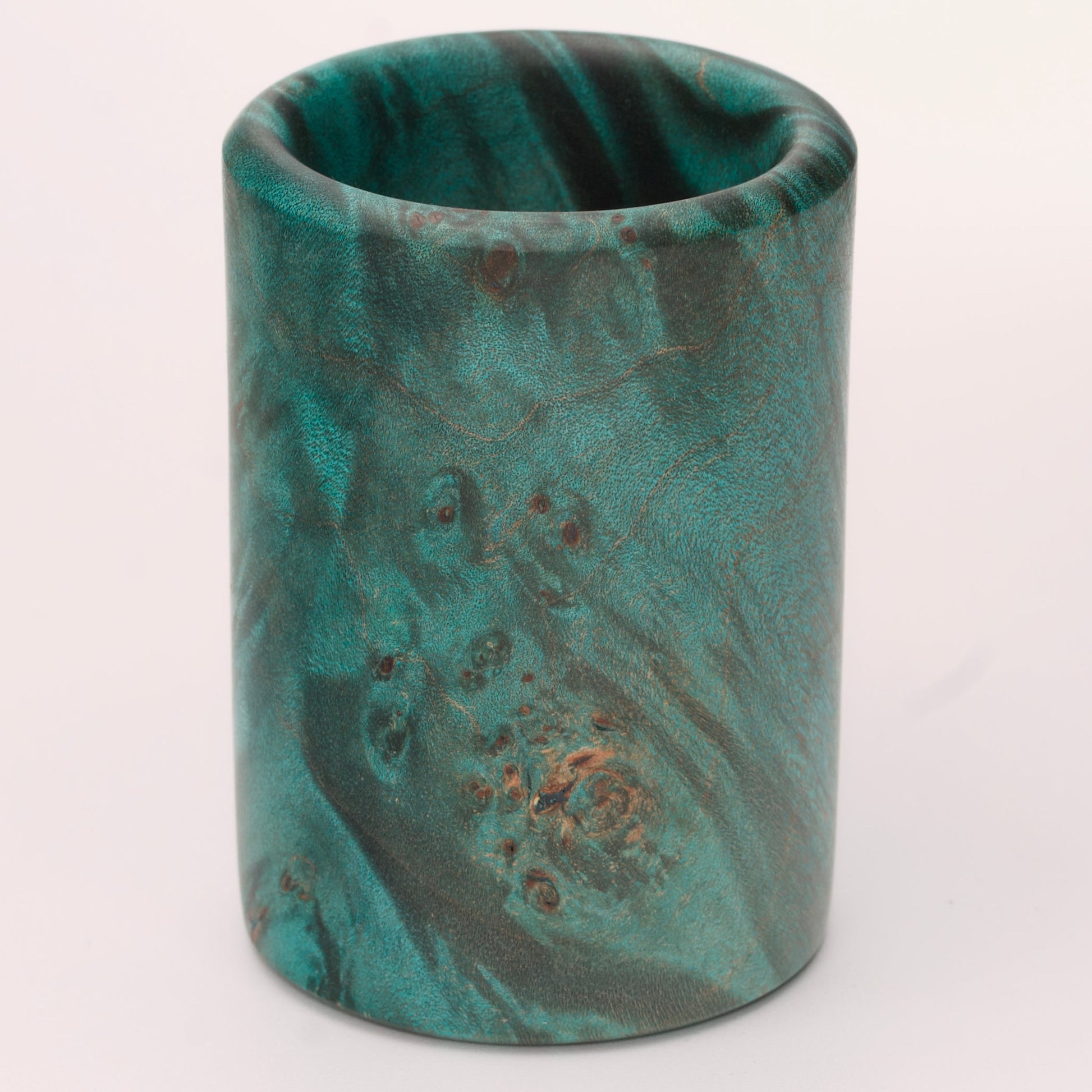 Green dyed Mappa Burl shot glass against white background
