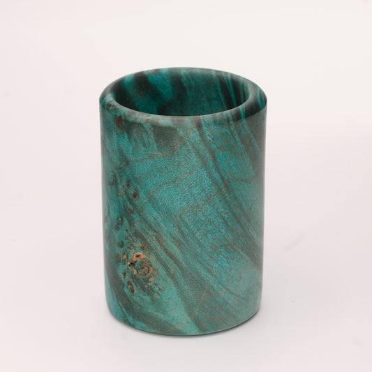Green dyed Mappa Burl shot glass against white background
