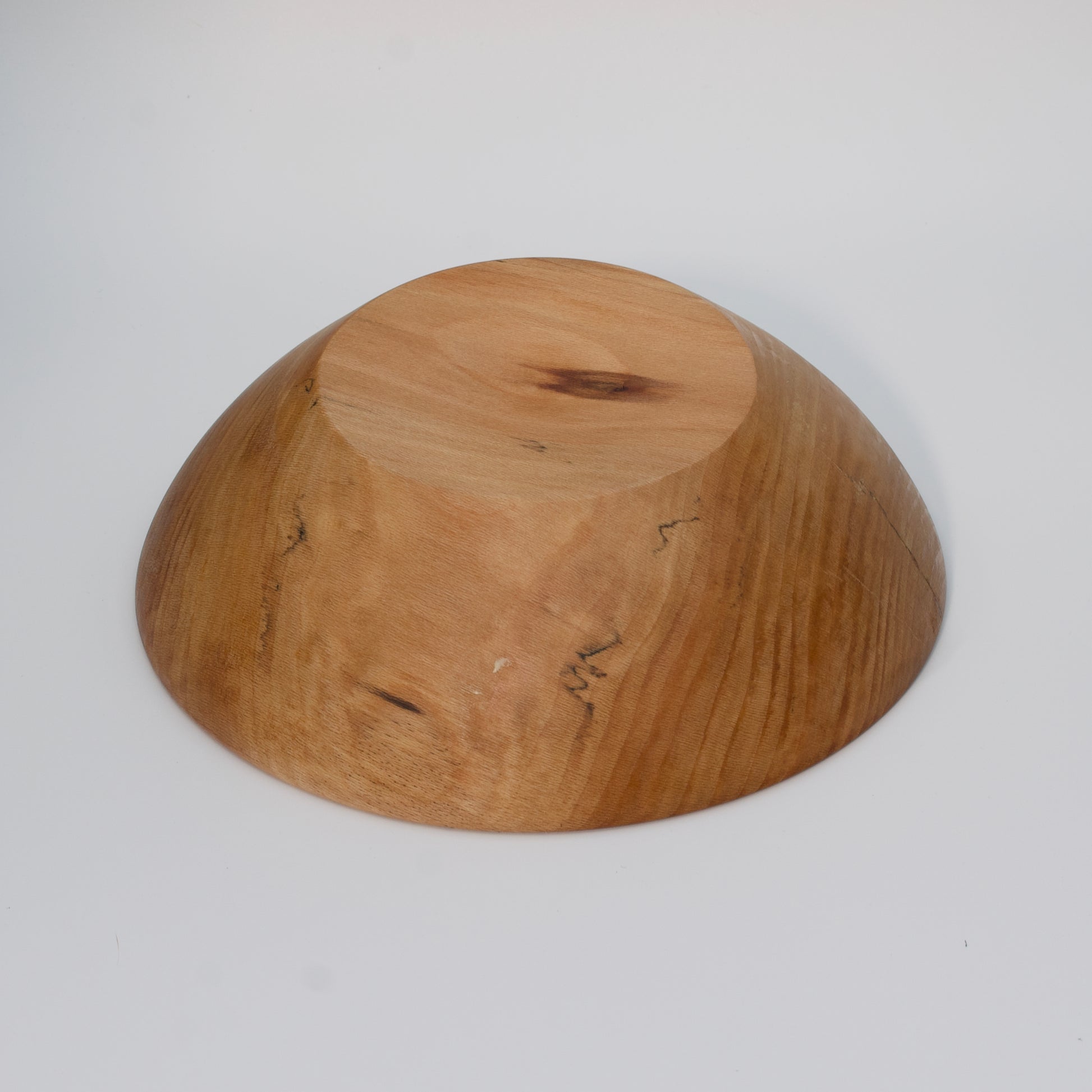 Wooden bowl on a white background