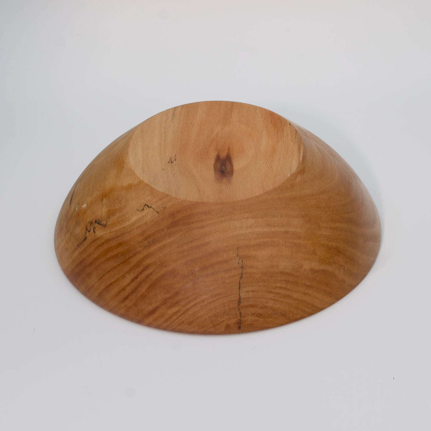 Wooden bowl on a white background