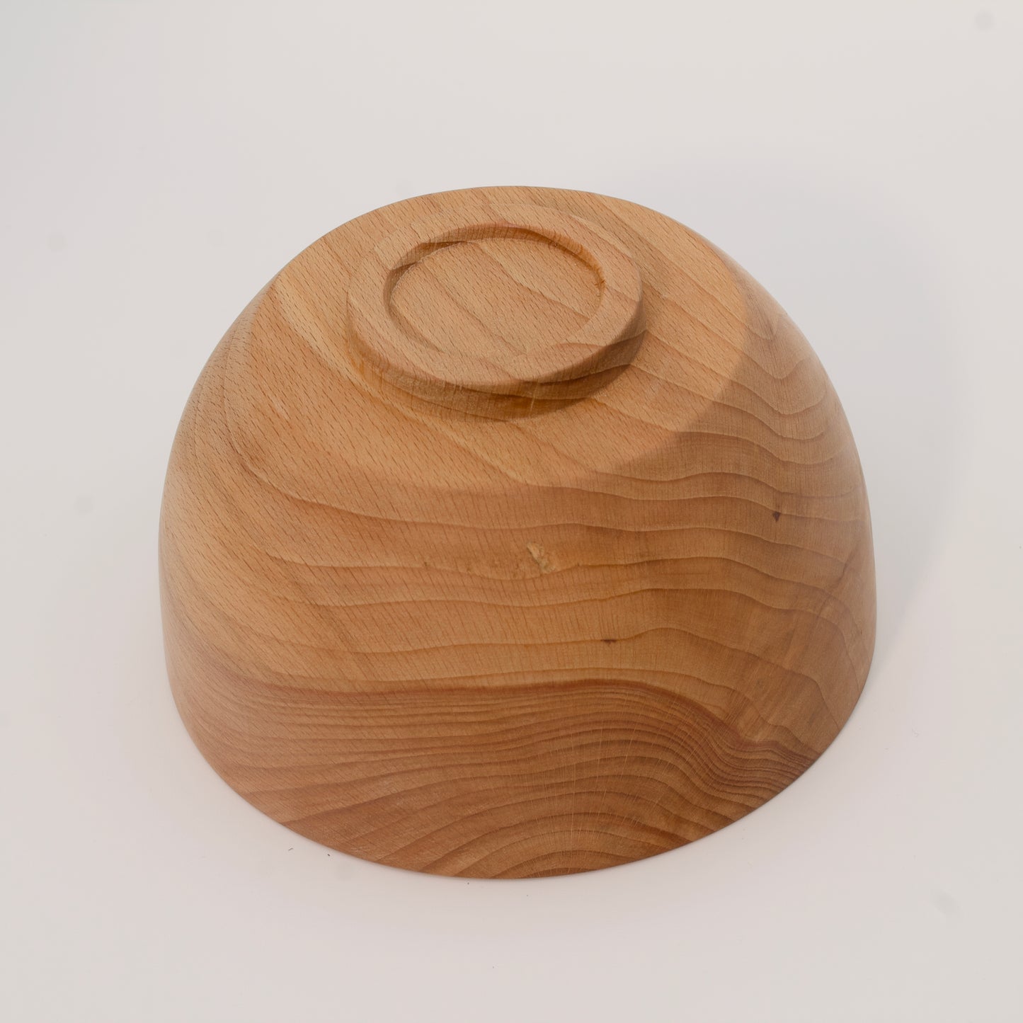 Wooden bowl on a white background