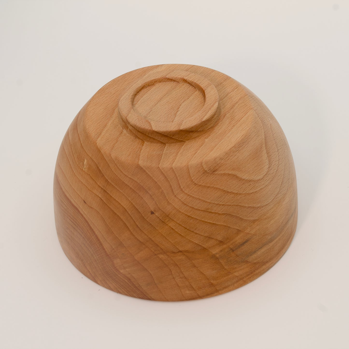 Wooden bowl on a white background