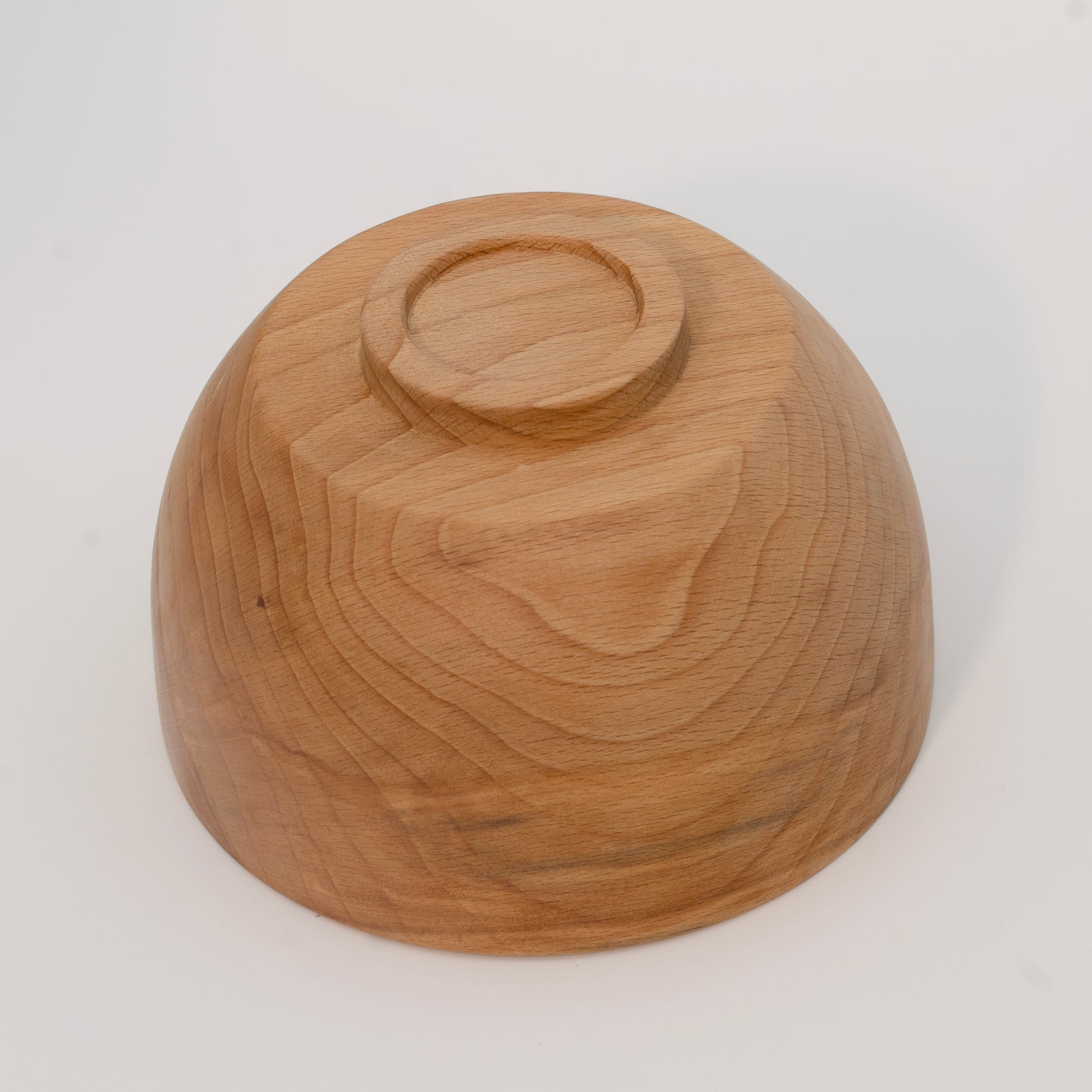 Wooden bowl on a white background