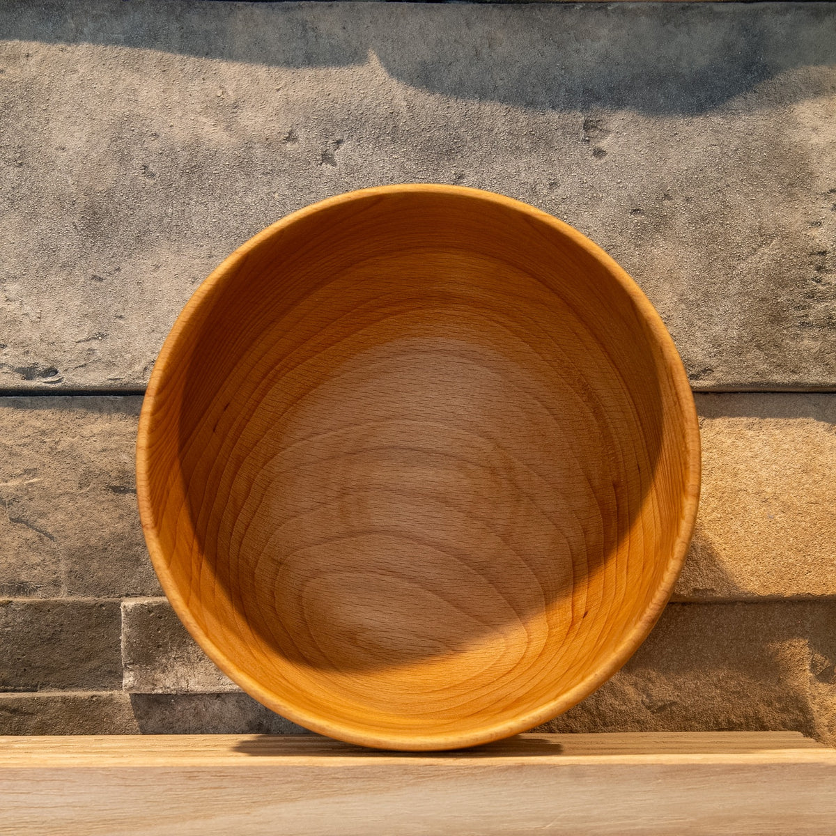 Interior of The Alabaster Basin European Beech bowl showing warm grain, rim, and usable depth
