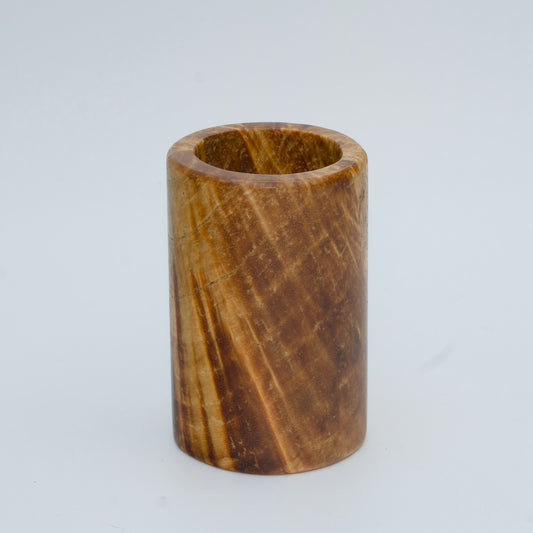 Box elder burl wood shot glass against white background