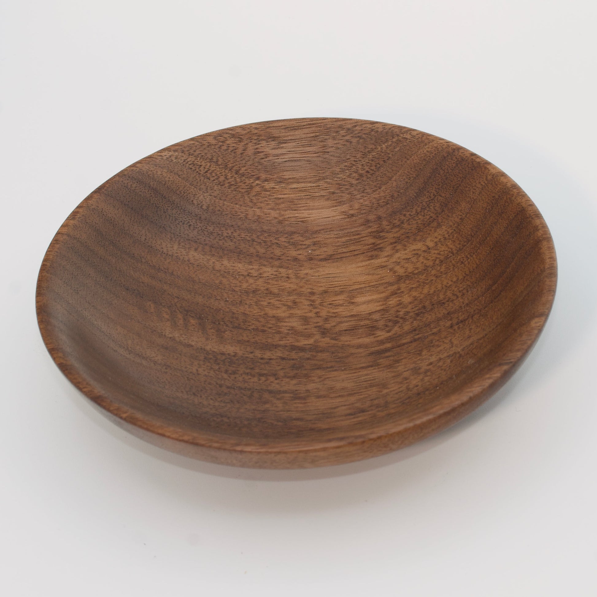 Wooden plate on a white background