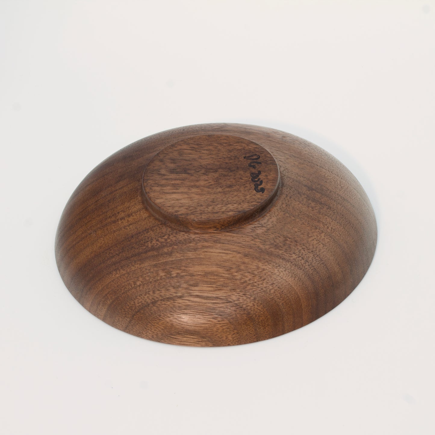 Wooden plate on a white background