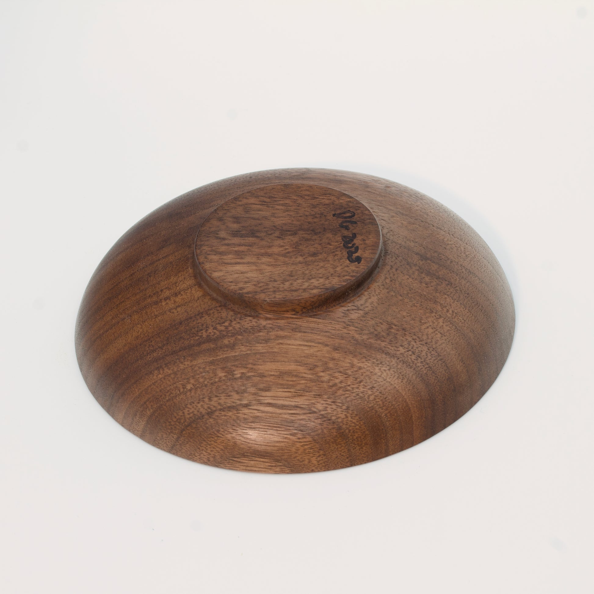 Wooden plate on a white background