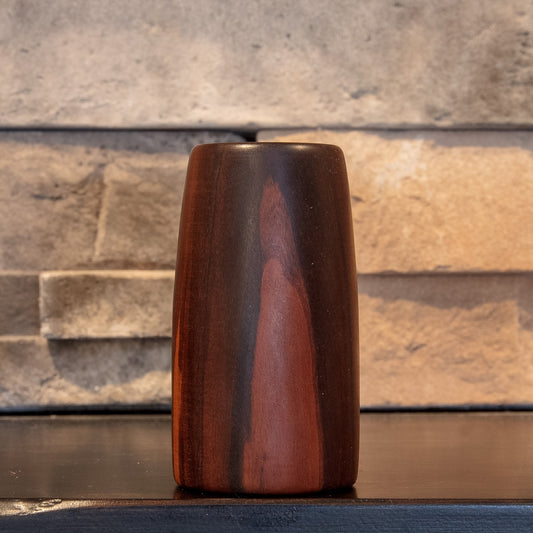 The First Lesson Eastern Redbud shot glass showing flame-like reddish figure against dark heartwood